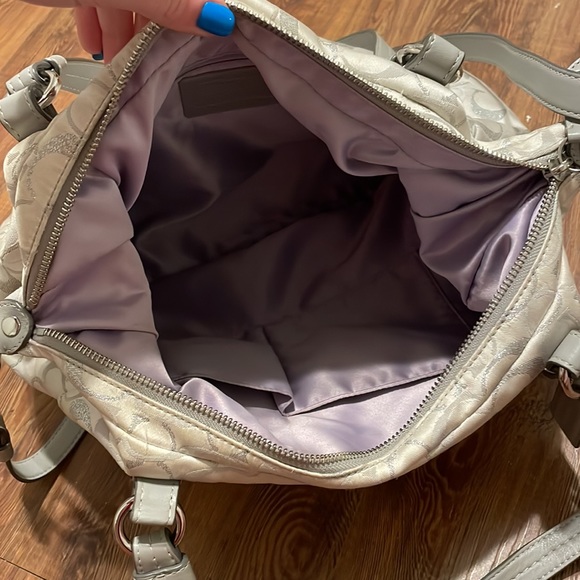 I am selling this Coach white purse with silver C’s on it. - Picture 3 of 4